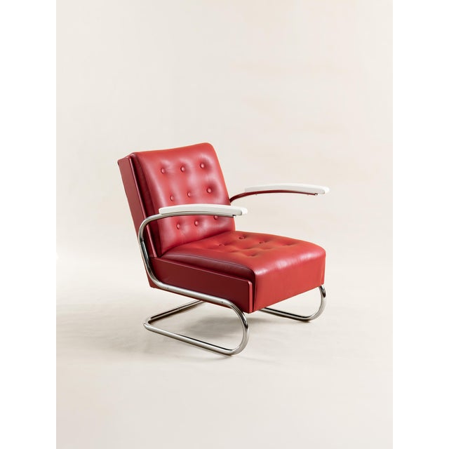 - Iconic upholstered armchairs model H 275 - with unmistakable shape of the beech wooden armrests - The surface of...