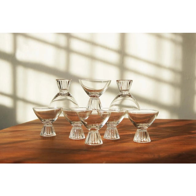 A stunning set of eight crystal cocktail glasses in the style of Paden City from the 1950s. Each glass features a...