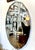 Gibson Studio Paul Oval Mirror. Polished stainless steel frame with an antique mirror. There are cleats on the back to...