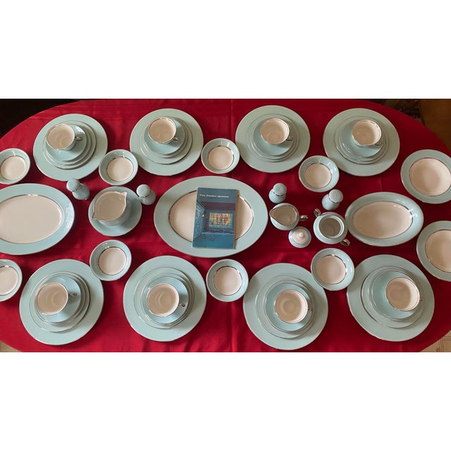 Elevate your next gathering with this stunning vintage mid-century modern fine china dinnerware set by Nancy Prentiss in...