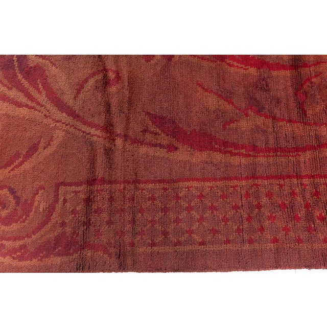 This striking 1880s French Savonnerie rug captures the opulent spirit of the Belle Époque with its bold design, rich color...