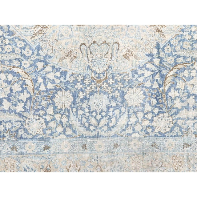 This Semi Antique Persian Tabriz Rug features a stunning design and quality craftsmanship. With a size of 7'9" x 11', it...