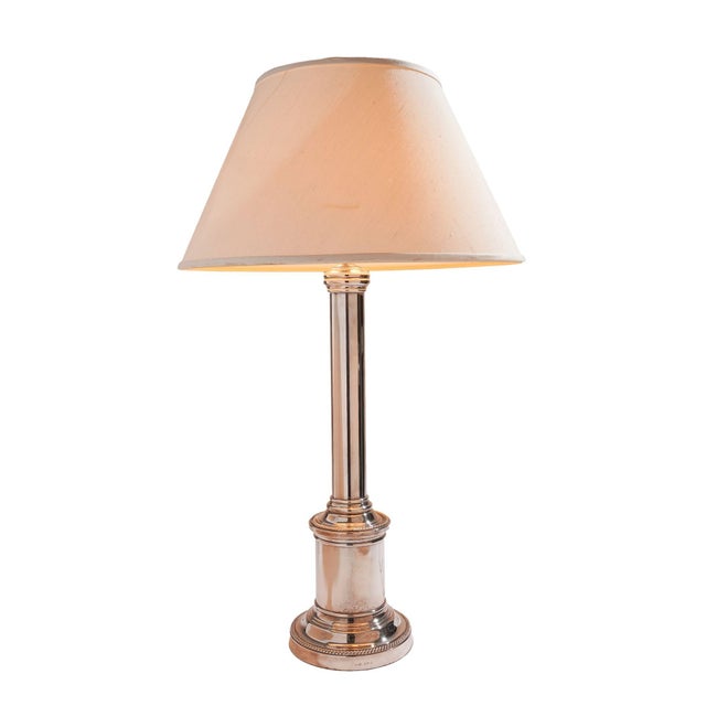 English hallmarked kerosene or oil banquet table lamp in silver plated nickel. The lamp is a doric column design with a...