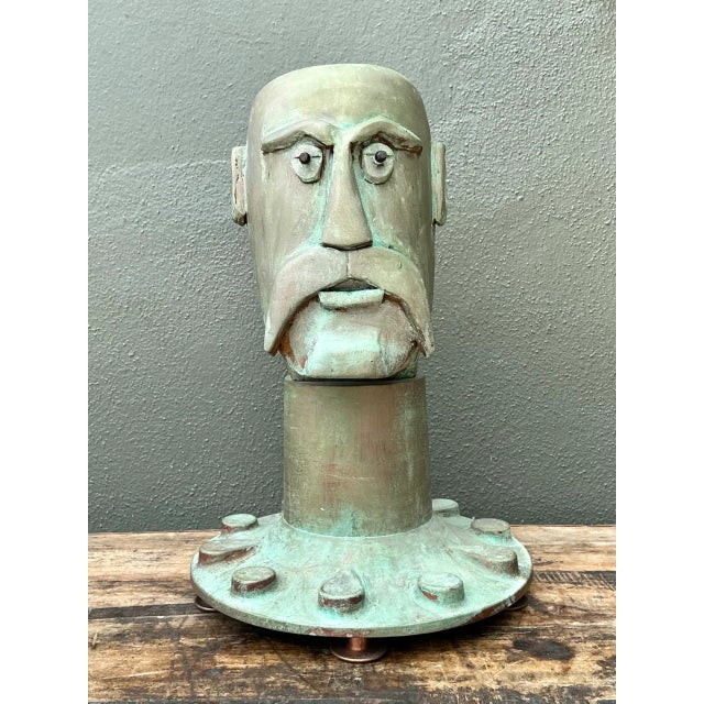 Showcasing expressive folk-industrial character, this vintage sculpted resin bust depicts a stylized man with a prominent...