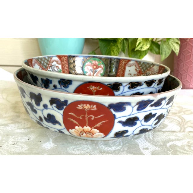 The Japanese Imari Porcelain Footed Rice Serving Bowls are stunning pieces adorned with hand-painted in characteristic...