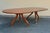 Ralph Lauren Dining Traditional Oval Table in mahogany on double pedestal with brass capped legs and optional 22”...