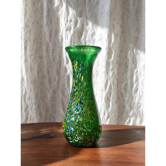 A distinctive hand-blown Hungarian art glass vase by Gyula Budveszel, dating from the 1990s. The vase has an elegant...