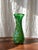 A distinctive hand-blown Hungarian art glass vase by Gyula Budveszel, dating from the 1990s. The vase has an elegant...
