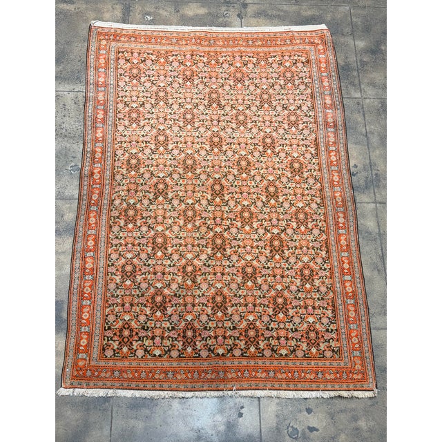 This exceptional 1880s Senneh Kurdistan rug features a finely detailed allover fish design, traditionally associated with...