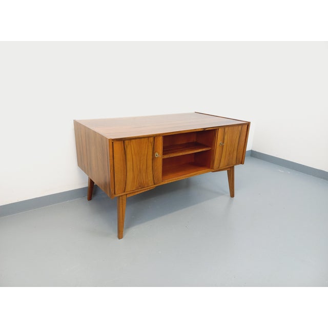 Large vintage Scandinavian-style executive desk from the 1960s, made of teak, double-sided for placement in the center of...