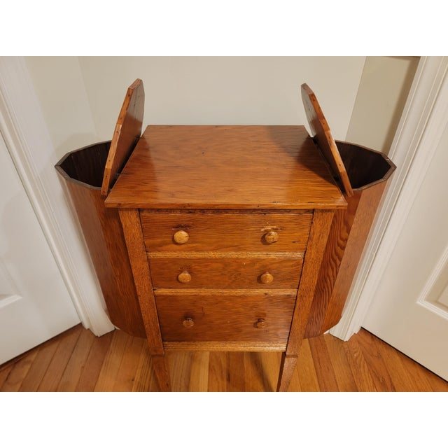 This handsome American Colonial Revival Martha Washington sewing cabinet dates to approximately 1925–1935 and is crafted...