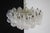 Italian vintage chandelier in Murano glass and white painted metal structure. The armor polished nickel supports 37 large...