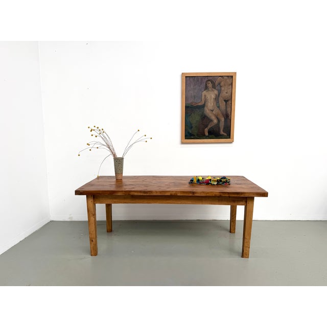 Maison lecan presents this rare piece: a large 1950s dining table that embodies raw craftsmanship and the nobility of...