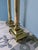Pair of late 20th century art deco style lamps featuring a Corinthian-style fluted column design and scroll base.