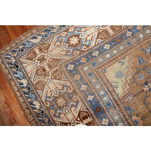 Rare Room size Antique Khotan Rug from the 1st quarter of the 20th Century Measures: 10'10" x 13'7" Khotan rugs were...