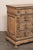 An Italian wood chest of drawers, with elaborate high relief carvings, from the 18th century. This antique chest from...