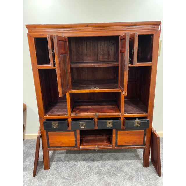 This gorgeous Vintage/Antique Asian Brown Storage Cabinet is a conversation piece for sure. Made of Elm wood and hand...