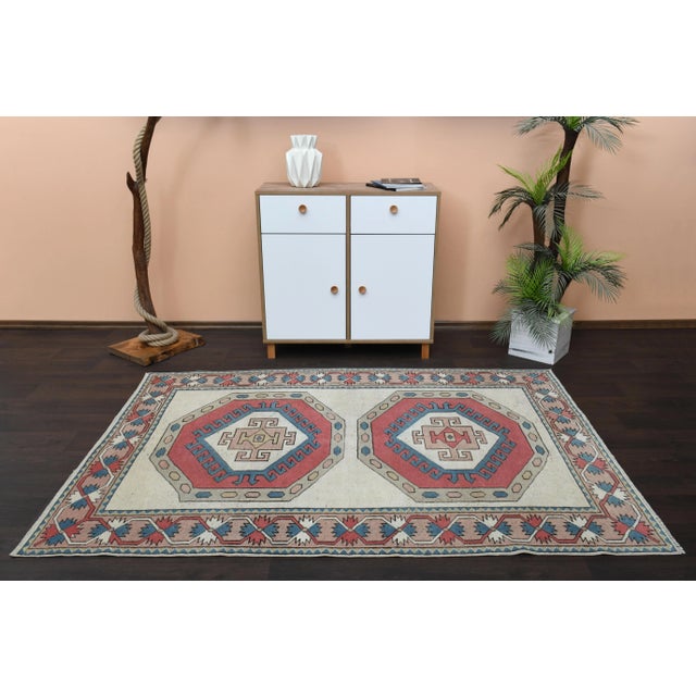 Vintage Turkish Hand-Knotted vintage rug is a semi-antique vintage Area rug.'70s Eastern region of Turkey's unique rug is...