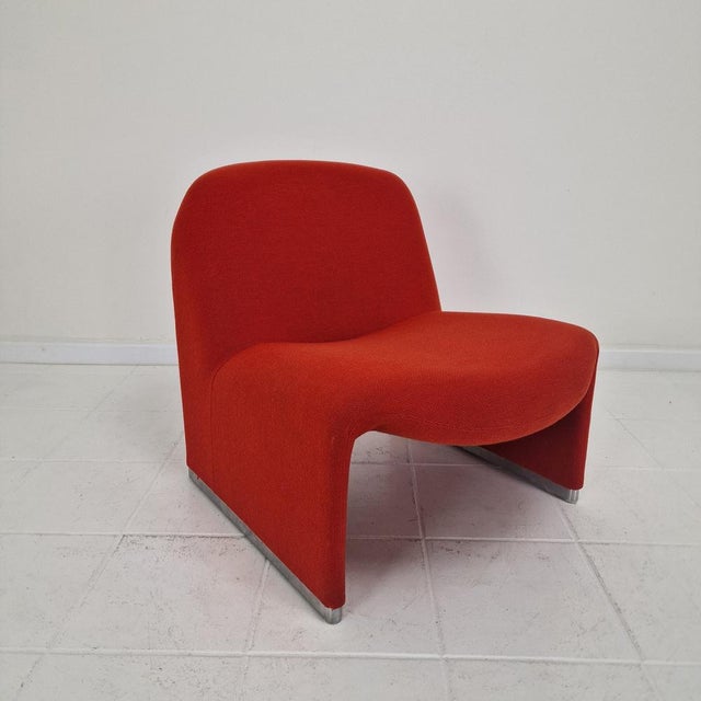 An iconic Alky lounge chair, designed in the 1970s by Giancarlo Piretti and produced by Castelli (Anonima Castelli). This...