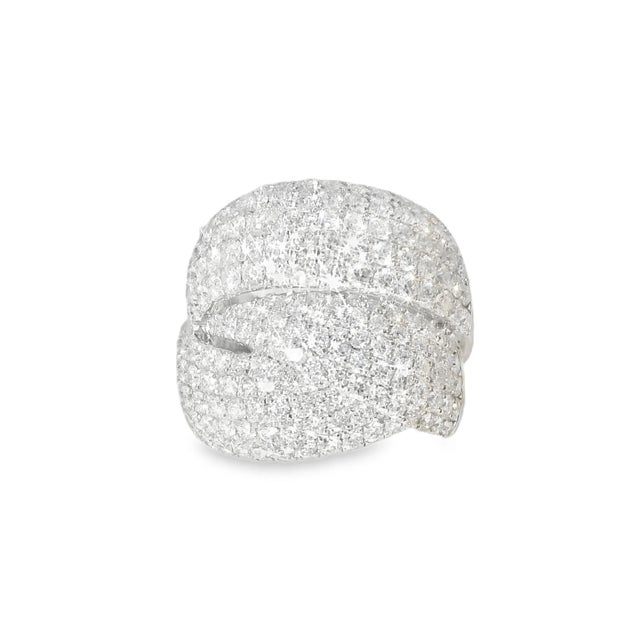This breathtaking 18K white gold diamond designer ring exudes luxury and elegance. Featuring numerous brilliant round...