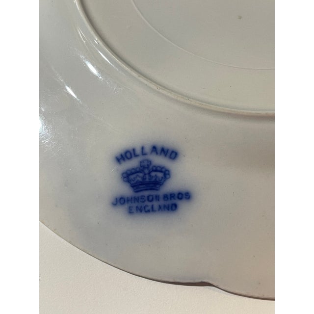 This is a beautiful example of flow blue dinnerware. This Antique Johnson Brothers Flow Blue Holland Plate is striking in...