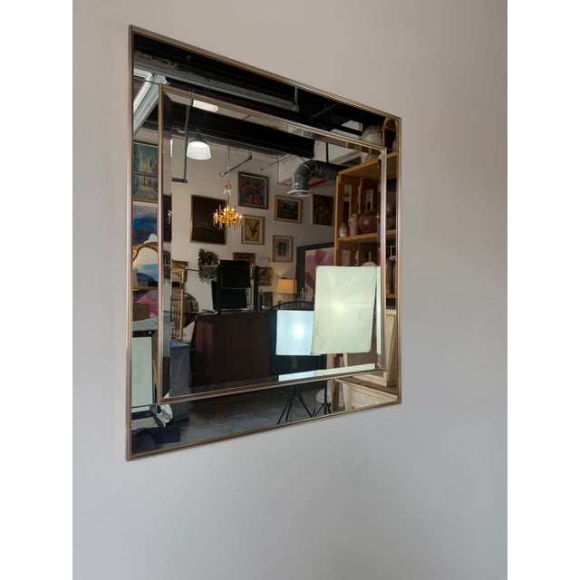 Elegant and timeless, this 1980s La Barge-style wall mirror features a sophisticated geometric design with a brushed...