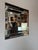 Elegant and timeless, this 1980s La Barge-style wall mirror features a sophisticated geometric design with a brushed...