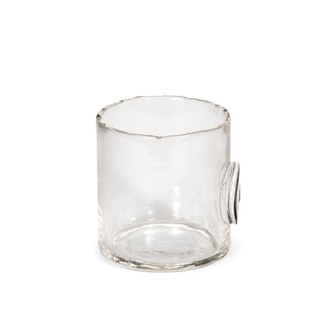 This Monogrammed Glass Votive is crafted using the traditional scissor-cut method, where artisans hand-cut the glass while...