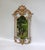 An elegant bronze wall mirror, made in France. The mirror is marked twice on the back with MOD DEP. The bronze frame is...