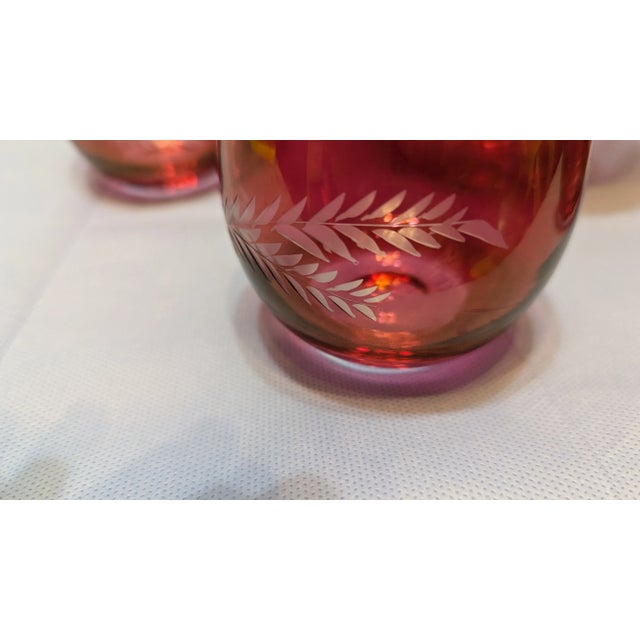 Lovely vintage Etched Brandy Glass 6. The set contains 7 pieces...6 glasses and the pitcher. There is no damage or chips ....