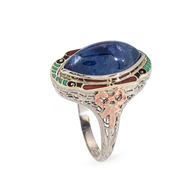 Vintage Art Deco era natural sapphire (heated) cocktail ring (circa 1930s) crafted in 14 karat white gold. Cabochon cut...