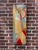 This artwork features a dynamic interplay of geometric shapes and vibrant colors, creating a sense of movement and energy....