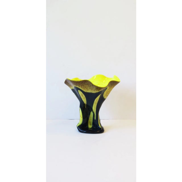 A very beautiful organic modern hand-blown bright neon yellow and dark teal blue studio art glass sculpture vase....