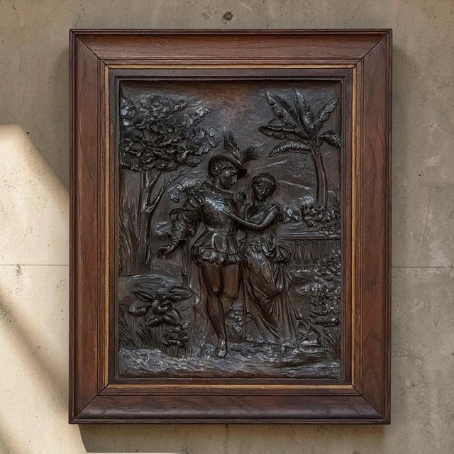 Rich in romance, artistry, and 19th century Renaissance Revival spirit, this hand carved walnut panel depicts a young...