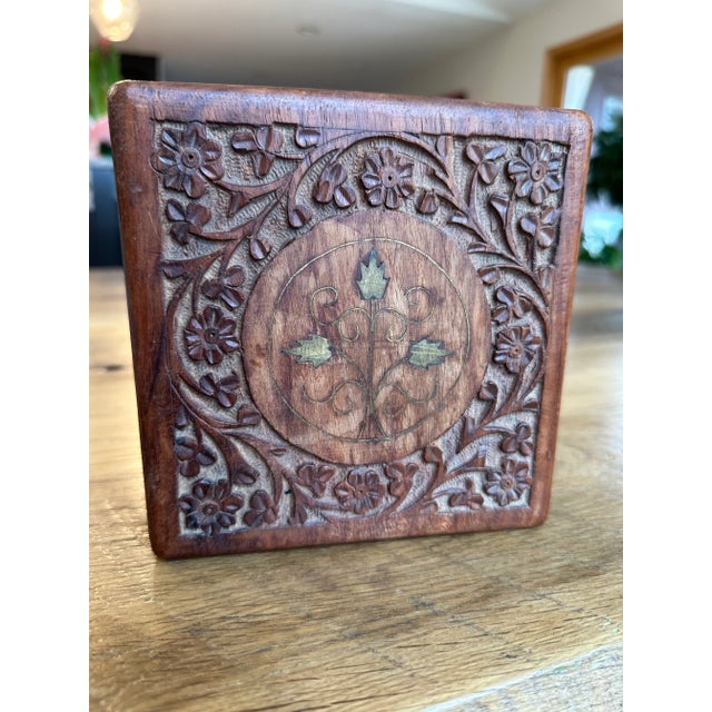 Vintage Hand Carved Wooden Box -Hinged Hand carved flowering design on top and sides. Circular Brass Inlay Flower Leaves...
