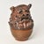 Incredible ceramic Okinawan awamori bottle with the traditional guardian deity Shisha lid. Likely a souvenir of liquor...