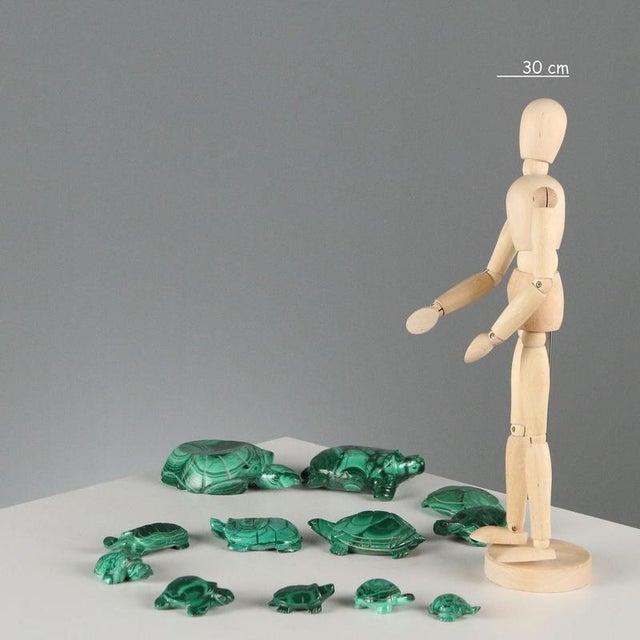 Group of 12 malachite turtles of different shapes and sizes. This piece is attributed to the mentioned designer/maker. It...
