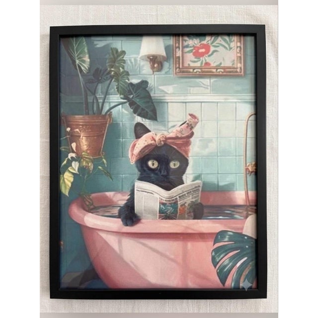 This adorable 8×10" art print features a stylish black cat lounging in a pink clawfoot tub, reading the newspaper like the...