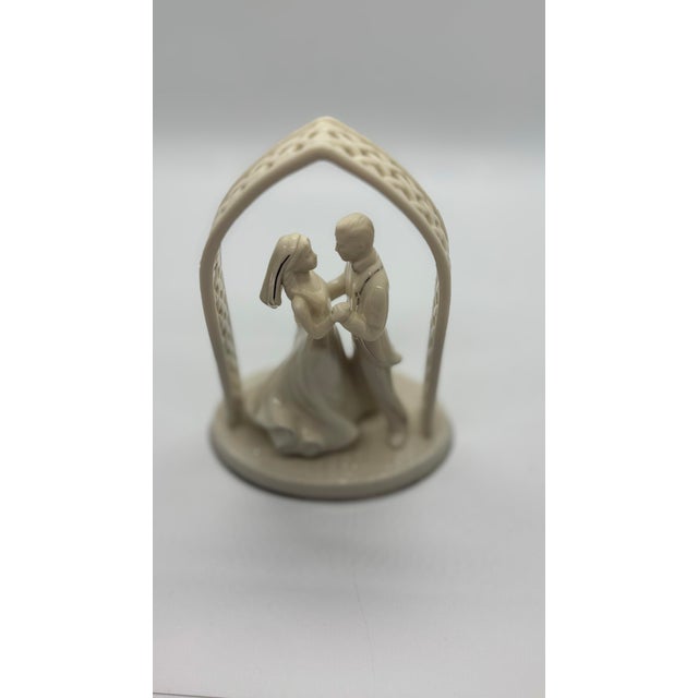 Celebrate a lifetime of love with this exquisite Lenox Wedding Promises Forever Yours cake topper. This elegant piece...