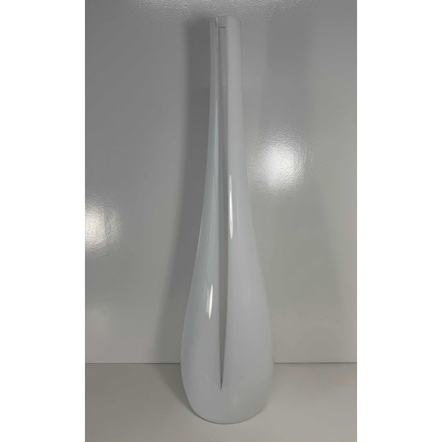 Elegant and highly decorative Murano glass vase, handcrafted in Italy during the 1990s. The vase features a sophisticated...