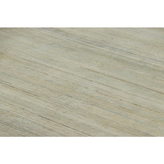 Hand-knotted in wool, this 10x11 rug is a rich new addition to Rug & Kilim’s Textural rug collection—with an impressive...