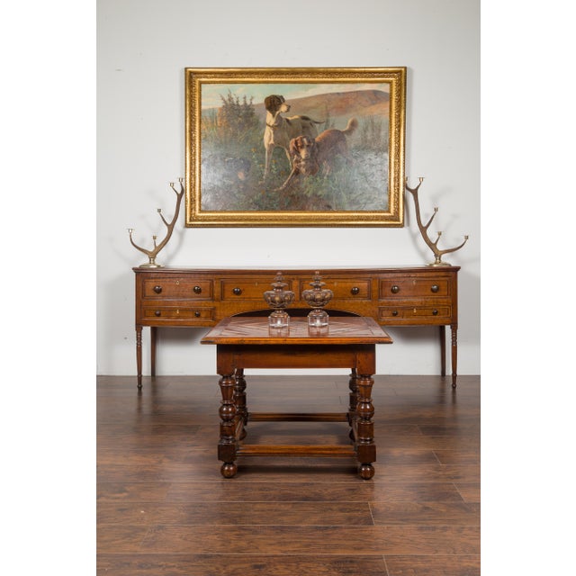 A pair of Italian walnut fragments from the early 19th century, with carved motifs in the front, gilt accents and new...