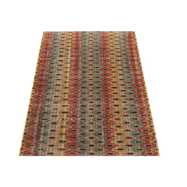 Hand-knotted in Turkey originating between 1960-1970, this vintage 4x7 mid century modern rug is the latest to join our...