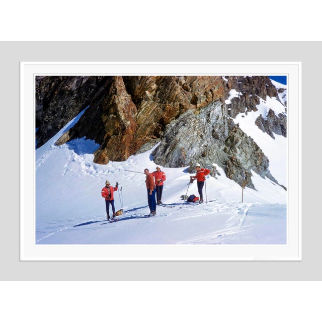 Mountainside Rest by Toni Frissell A group of skiers ponder their journey on the infamous “Haute Route”, Switzerland,...
