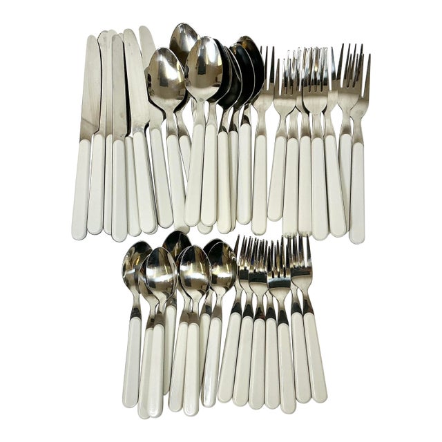 1970s Vintage Boho Chic Contemporary Stainless Steel White Handle Flatware - Set of 40, Service for 8 For Sale