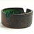 A unique, small ashtray, handcrafted from ceramic. The exterior is raw clay finished with a transparent glaze. The...