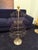 This charming antique French iron dress form features a sculptural wire silhouette with a rounded finial top and circular...