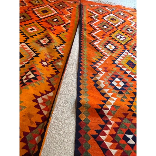 1920s woven wool Afghan Kilim orange/green/black fringed throw, tapestry or rug. Appears to be two runner-sized pieces...