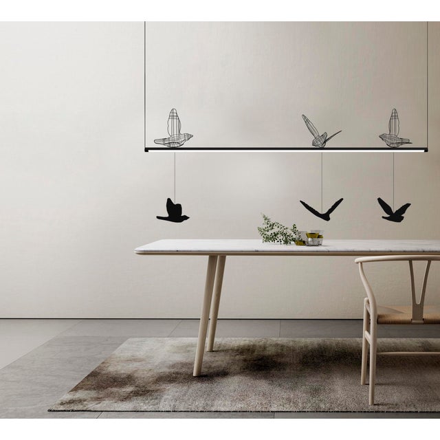 This luminaire is more than just a lighting fixture. It is a philosophical sculpture that explores the dynamics of form,...