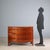 Mid-19th century English mahogany chest of drawers, featuring elegant maple inlays on the top and ebony at the base. The...